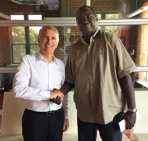 Wade Coye giving a handshake to a satisfied client